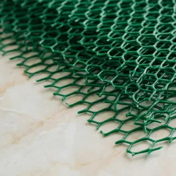Close-up of an erosion control mat designed to stabilize slopes and support vegetation growth