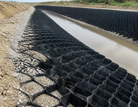 Drain and canal lining project using geocells to stabilize channels and reduce soil erosion